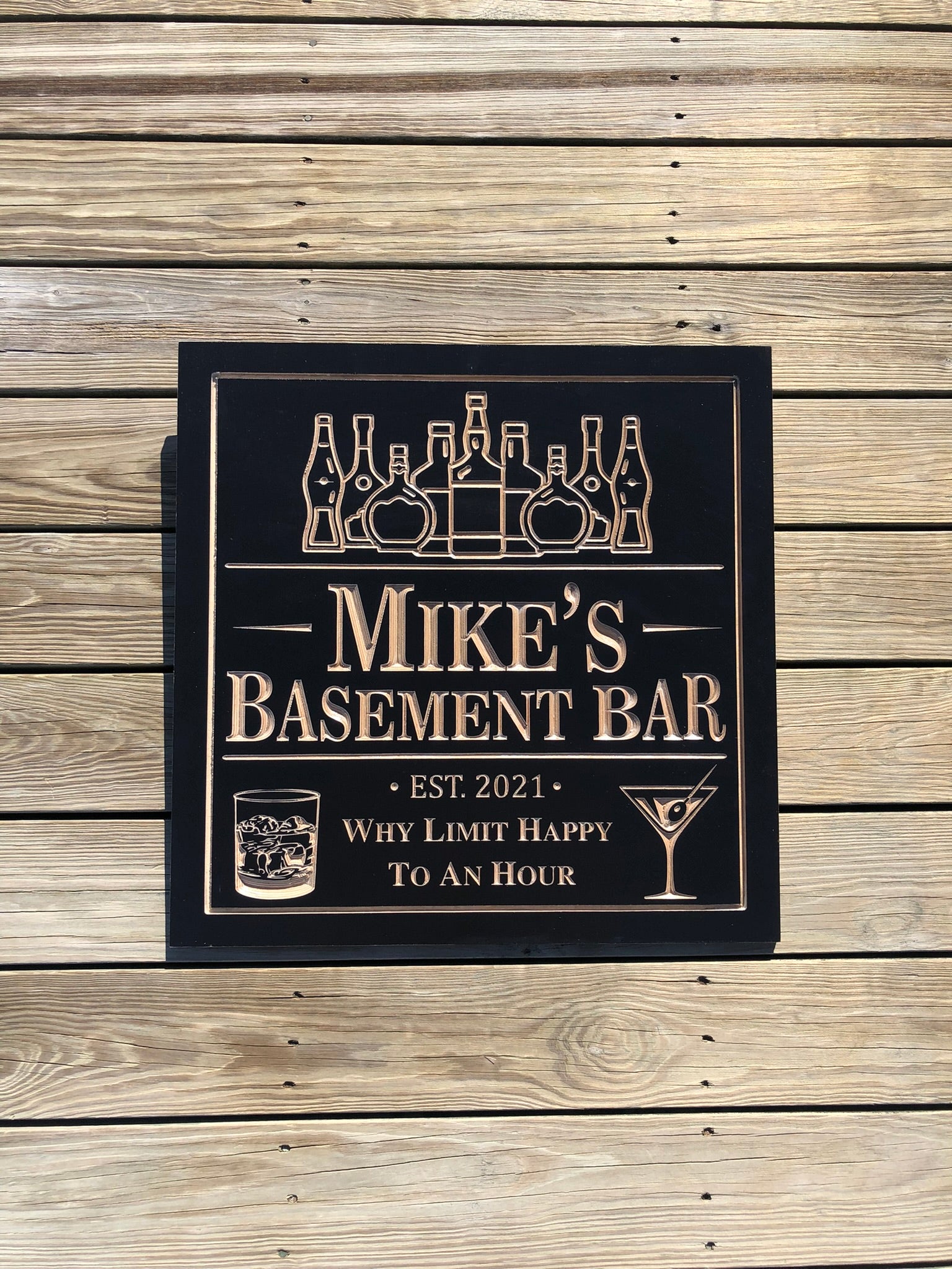 Personalized basement bar sign engraved on wood, custom man cave sign with name, established date, whiskey bottle design, and home bar decor handcrafted by The Humble Chisel.